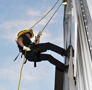 Firefighter Scaling Building