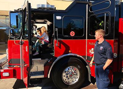 Kids in the Driver's Seat of Fire Truck